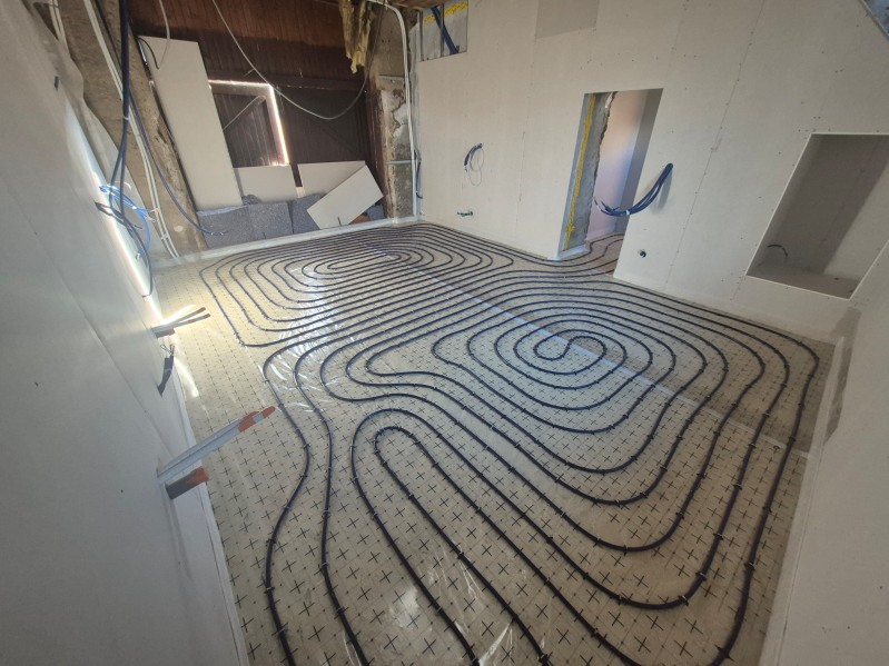 Installation d'un plancher chauffant hydraulique basse température en rénovation à Burcin dans le Nord Isère prés  d'Apprieu